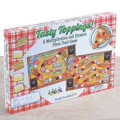 the tasty toppings board game is in its box