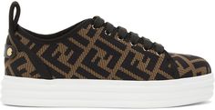 Low-top jersey sneakers in brown featuring jacquard logo pattern in black. Perforated detailing throughout. Round toe. Lace-up closure in black. Padded tongue and collar. Pull-loop at heel collar. Buffed lambskin pull-loop with press-stud fastening at heel counter. Buffed lambskin lining in black. Textured rubber platform midsole in white featuring embossed logo pattern. Treaded rubber outsole in white. Gold-tone hardware. Approx. 1.5 platform. Supplier color: Brown/Black Luxury Black Sneakers With Padded Tongue, Luxury Low-top Sneakers With White Laces, Fendi Force Sneakers, Luxury Sneakers With Padded Tongue And Round Toe, Luxury White Round Toe Platform Sneakers, Retro Tennis Shoes, Retro Tennis, Fendi Clothing, Flatform Sneakers