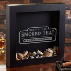 Choose the been there smoked that personalized cigar label shadow box to creatively display and store used cigar bands. Great for birthdays, father's day, retirement gifts, and other special occasions. The cigar lovers in your life will love showing off their smoking accomplishments! Customize: Yes | Personalization Mall Cigar Label Shadow Box Wood in Black / Brown, Size 12.0 H x 12.0 W x 2.0 D in | Wayfair | Home Decor Groomsmen Ideas, Bday Gifts For Him, Surprise Gifts For Him, Personalization Mall, Thoughtful Gifts For Him, Romantic Gifts For Him, Groomsmen Gifts Personalized, Diy Gifts For Him, Cigars And Whiskey