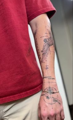 a man with a tattoo on his arm