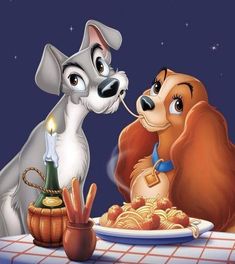 lady and the tramp eating spaghetti together in front of a dog with a candle