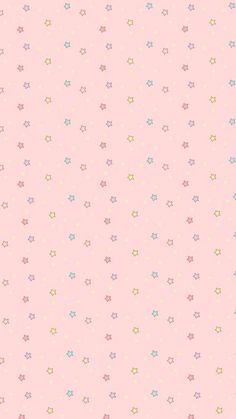 a pink background with small stars and dots