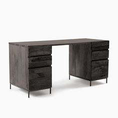 an office desk with three drawers and two legs