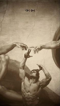 two men reaching for each other in front of a painting with their hands on the wall