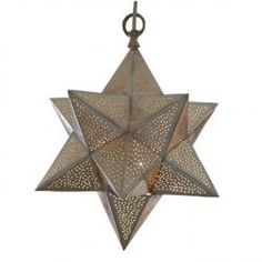 a metal star hanging from the ceiling