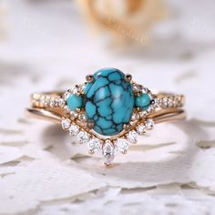 This is 6x8mm oval cut turquoise engagement ring yellow gold. The accent stones are VVS man made cz diamond. The stones can be replace with other gemstones.For example,if you don't like the CZ accent,you can ask me replace it with tourmaline,aquamarine,diamond,emerald,sapphire... For custom making jewelry,it can be made in 2 different metal(Please contact me if you need this one made in solid gold). 1,Solid gold,including 14/18k white/rose/yellow gold. 2,925 sterling silver with white/yellow/ros Oval Jewelry With Side Stones For Gift, Gift Oval Jewelry With Side Stones, Gift Jewelry With Oval Side Stones, Turquoise Oval Cabochon Wedding Jewelry, Oval Rings With Side Stones For Gift, Elegant Oval Cabochon Turquoise Wedding Ring, Gold Oval Turquoise Wedding Ring, Gold Oval Turquoise Ring For Wedding, Anniversary Turquoise Ring With Diamond Accents