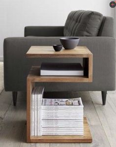 a living room with a couch, table and chair