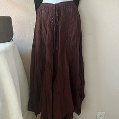 35 Inch Long Skirt With Tie At The Waist String . With Sequins On It. Good Condition, No Discoloration, Not Torn Bohemian Asymmetrical Pleated Maxi Skirt, Bohemian Midi Skirt For Festivals, Spring Festival Bottoms With Gathered Skirt, Long Vacation Skirt, Relaxed Bohemian Maxi Skirt, Bohemian Skirted Bottoms In Brown, Brown Skirted Beach Bottoms, Flower Skirts, Mermaid Tail Costume