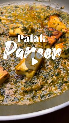 a pan filled with food and the words palak pareen on top of it