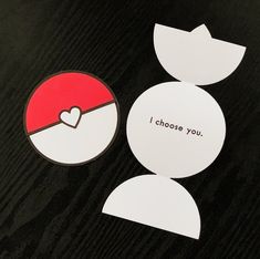 a piece of paper with the words i choose you on it and a pokeball