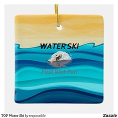 an ornament hanging on a wall with the words water ski in front of it