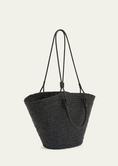 "Find LOEWE Medium Anagram Raffia Basket Tote Bag on Editorialist. Loewe raffia and leather basket tote bag with Anagram accent Top handles Shoulder straps Can be worn as a top handle or shoulder bag Open top with self-tie closure Approx. 9.6\"H x 17.9\"W x 6.2\"D Made in Spain" Luxury Black Straw Bag With Adjustable Strap, Black Leather Bucket Bag For Vacation, Elegant Black Woven Leather Straw Bag, Elegant Black Straw Bag, Elegant Handwoven Bucket Bag For Shopping, Luxury Black Bucket Bag For Summer, Luxury Black Summer Bucket Bag, Elegant Black Handwoven Straw Bag, Raffia Basket