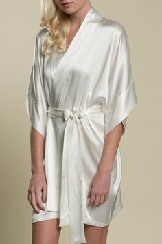 Our signature Samantha silk robe has an easy, draped fit that is oh so flattering! Now available in a wide range of colors to suit every taste & mood. Beautiful as luxurious getting ready bridal lingerie for your big day and perfect as honeymoon loungewear. Style with flirty lingerie for a glamorous look that can be worn long after the wedding. Treat yourself to 100% silk that feels amazing against the skin and drapes effortlessly. Designed with wide kimono sleeves, couture banding (no visible s Honeymoon Loungewear, White Silk Robe, Robe Bridesmaids, Pijama Satin, Loungewear Style, Silk Bridesmaid Robes, Bridesmaids Robes, Perfect Honeymoon, Lounge Outfits