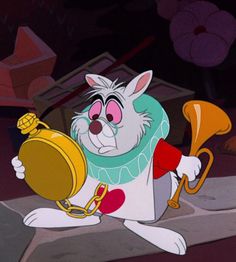 an animated rabbit holding a golden bell and looking at the camera while sitting on a stone floor