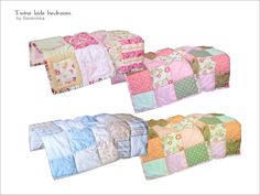 four different types of baby quilts on display