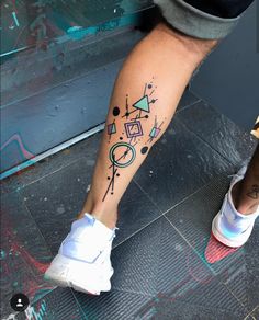 a person with a tattoo on their leg