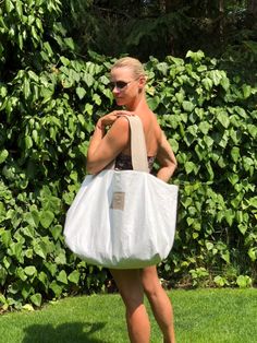 "Linen Tote Bag, Linen Beach Bag in Natural Color, Burlap Tote Bag, Big Beach Bag, Natural Shopper Linen, Burlap Shoulder Bag, Tyvek Bag Linen- Tyvek overside , double-sided tote bag, you can use it as shopper bag, summer beach bag or everyday bag. The bag has wide handles made out of washed linen too.  The linen can be in color: natural, pink, light grey, grey, navy, black. Inside is always white Tyvek.  Unique design only to buy in Tavana Studio. DETAILS: *made from 100% pre- washed linen and White Hobo Tote Bag For Beach, Summer Shoulder Beach Bag With Removable Pouch, Summer Beach Shoulder Bag With Removable Pouch, White Tote Hobo Bag For Beach, White Hobo Shoulder Bag For Beach Season, Eco-friendly Summer Pouch Shoulder Bag, White Large Capacity Summer Bag, White Beach Hobo Bag With Adjustable Strap, Summer Bags With Removable Pouch