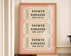 a framed movie poster with the words shower, karaoke and one entry on it