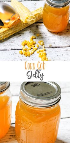 two jars filled with corn sitting on top of a wooden table next to spoons