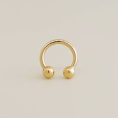 The perfect first pair, these piercing earrings set in 14K gold each feature a 3mm Ball Ear piercing. These short post earrings secure with friction backs. Dainty Septum, Diamond Nose Piercing, Nose Hoop Piercing, Hoop Piercing, Gold Nose Hoop, Nose Piercing Hoop, Nose Piercing Jewelry, Gold C, Septum Jewelry