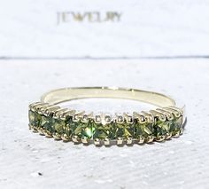 Don't miss this opportunity to own this beautiful gemstone ring crafted in 14k gold filled You can wear the rings as a set together or each ring by it self. => Gemstone Type - Peridot => Gemstone Size - 2.75 mm => Gemstone Cut - Faceted => Total Number of Gemstones - 9 => Metal Type - 14k Gold Filled (Tarnish Resistant And Nickel Free) - also available in 925 sterling silver * Please contact me for pricing on a sizes larger than 11 * ~ Feel free to ask me about custom made designs. ❏ Replacement Yellow Gold Peridot Stackable Rings For Anniversary, Stackable Peridot Anniversary Jewelry, Stackable Peridot Jewelry For Anniversary, Stackable Peridot Rings For Anniversary, Peridot Ring With Prong Setting As Gift, 14k Gold Princess Cut Gemstone Ring, Princess Cut Gemstone Ring In Yellow Gold, 14k Gold Rings With Vs Clarity For May Birthstone, 14k Gold Ring With Vs Clarity For May Birthstone