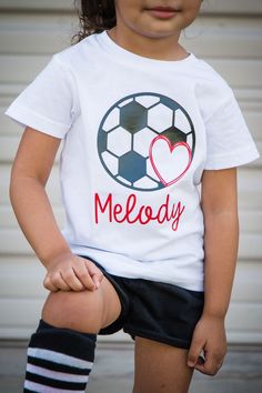 "♥ \"Personalized Soccer\" shirt or bodysuit is personalized with heat transfer vinyl. Design is applied with a commercial heat press. ♥ SIZING - Please review our FAQ section and size chart photo for details on brands we use and sizing. ♥ Adult sizes are available upon request. ♥ Bodysuits and shirts are machine washable - we recommend washing inside out and laying flat to dry, however they are safe to dry in a dryer on normal settings as well. Do NOT iron over the design. ♥ All products are ma Toddler Soccer Outfit, Soccer Centerpieces, Soccer Girls Outfits, Soccer Family, Toddler Soccer, Soccer Love, Soccer Birthday Parties, Soccer Outfit, Soccer Birthday