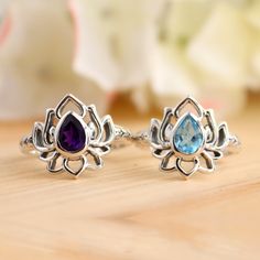 Natural Blue Topaz Lotus Ring-Handmade Lotus Amethyst Silver Ring-Sterling Silver Ring-Silver Lotus Ring-Gift for her- December Birthstone Stone Material:-  Amethyst, Blue Topaz Weight (Approx.):- 3.90 Gram Length:- 15mm Width:- 3 mm  Height:- 5 mM Stone Size (Approx.):- 7 x 5 mm Pear Total Number of Stones:  1 Stone Setting: Bezel Setting Metal: 925 Sterling Silver Finish: High Polish GN-R-1089 Spiritual Blue Topaz Jewelry As A Gift, Silver Amethyst Ring, Spiritual Birthstone, Silver Birthstone Ring With Natural Stones For Gift, Spiritual Sterling Silver Flower Ring, Silver Birthstone Ring With Natural Stones For Promise, Spiritual Sterling Silver Gemstone Ring, Spiritual Gemstone Stackable Rings As Gift, Spiritual Crystal Ring With Gemstone Accents For Anniversary, Silver Birthstone Ring With Natural Stones For Anniversary