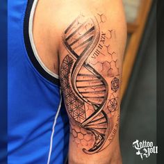 a man with a tattoo on his arm that has a drawing of a double - strander