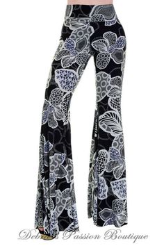 Uptown High waist soft skinny pants with very wide bell bottom. Big flower print, fold over waistband, lightweight slinky stretchy fabric, unfinished hem can be cut to fit. Made in USA Color: Navy & Black Mix Sizes S-M-L S M L Waist 28 30 32 Hips 34 35 36 Inseam 32 32.5 33 92% Polyester, 8% Spandex, Made in USA J3/B10172 Summer Hippie Outfits, Unique Leggings, Hippie Outfits, Big Flowers, Fashion Black, Black White Fashion, Bell Bottom, Fashion 2018, White Fashion