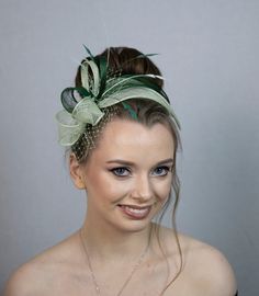 Green beautiful fascinator for your special occasions. Wear it at the weddings, races, church or any other event. Fits to so many people due to the shape of the fascinator. Fascinator has got hand-rolled leaves creating like a frame around your face. Leaves are well balanced at the side with loops, feathers and net making it more 3- dimensional and festive. This style is loved by so many as it fits to very many hair style and clothing you can wear with this headpiece. Fascinator will be custom m Green Headband For Wedding At Royal Ascot, Green Wedding Headband For Royal Ascot, Green Headband Mini Hat For Wedding, Green Headband For Royal Ascot Wedding, Green Headband For Wedding, Green Fascinator With Handmade Flowers For Party, Elegant Green Fascinator For Evening, Green Wedding Headband, Green Wedding Headband Hair Accessory