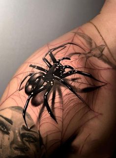 a woman's arm with a spider tattoo on it and an image of a face