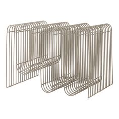 a set of three metal racks sitting next to each other