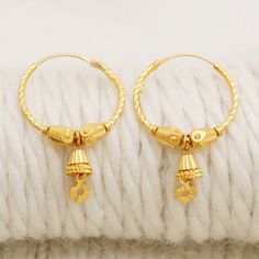 Please click -- Learn more about this item -- below for a full description 22k gold earrings handmade jewelry made in India weight is 4.02 grams approx. length is 3.5 centimeter approx. width is 2.1 centimeter approx. please message me if you want real gold screw/backs.