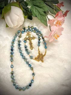 WELCOME TO OUR SHOP  This is a gorgeous handmade Miraculous Medal Immaculate Conception custom rosary. Beautiful glass beads with a gold centerpiece medal and a unique gold crucifix! Top quality is no exception, thoughtfully designed and carefully made with the finest material. Custom orders with personalized names, pictures and bulk orders are AVAILABLE :) Thank you for choosing us for your special occasion (Wedding, Communion, Baptism, Birthday, or Anniversary). Custom names are $3 per letter! Add our shop to your favorites so you can be notified with our new product! Follow us on Instagram @jmjcatholicshop We are truly happy and beyond blessed to be able to do what we love and make people happy with our rosaries. Thank you all for your love & support. May God bless you and mother Mary p Handmade Wedding Rosary With Cross Shape, Bridal Rosary, Gold Centerpiece, Wedding Communion, Handmade Rosary, Custom Rosary, Gold Centerpieces, Immaculate Conception, Miraculous Medal