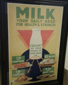 an old poster advertising milk for health and strength is displayed in a black framed frame