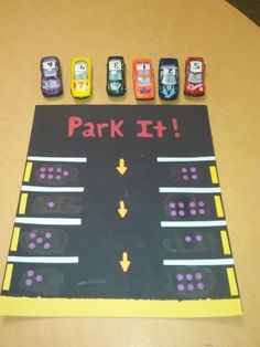 a game board with cars on it that says park it