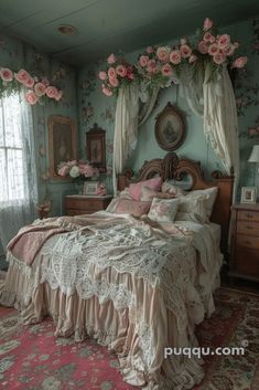 a bed with pink flowers on the headboard and canopy over it in a bedroom