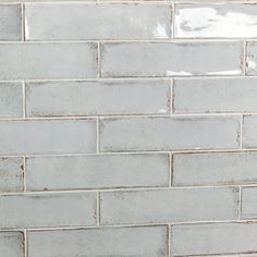 a white brick wall with no mortars or mortars on the bottom and sides