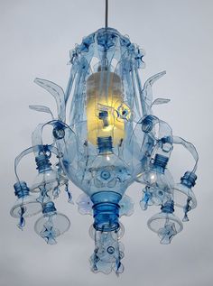 a blue chandelier hanging from a ceiling