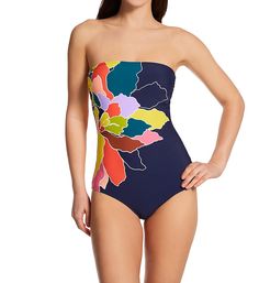 Wireless one piece swimsuit has fabulous floral graphic at sides and removable straps for strapless style. Great for tanning. Shelf bra has wireless cups with microfiber lining and pockets for light, removable padding, included. Elastic band under inner cups provides extra bust support. Underband has embossed logo that repeats to back. Straight neckline has covered elastic edge to keep fit close. Vibrant flower graphic is printed at sides. Sides of cups have ruching for added volume. Upper sides Strapless Swimwear For Spring Pool Season, Strapless Swimwear For Pool In Spring, Strapless Swimwear For Spring, Strapless Floral Print Swimwear For Sunbathing, Spring Strapless Tankini For Pool, Summer Strapless Swimwear With Floral Print, Multicolor Strapless Swimwear For Poolside, Strapless Printed Swimwear For Beach, Strapless Lined Swimwear For Swimming