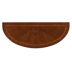 an oval shaped wooden shelf with carvings on the top and bottom, along with a white background