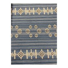 a blue and white area rug with geometric designs on the front, in two different colors