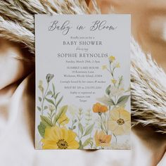 Baby in bloom shower invitation featuring yellow wildflowers, pastel hues, and sage green accents for a whimsical, gender-neutral celebration. Spring Baby Shower Invitations, Garden Baby Shower Theme, Garden Baby Showers, Wildflower Baby Shower, Yellow Wildflowers, Baby In Bloom, Spring Baby Shower, Bloom Baby, Floral Baby Shower Invitations