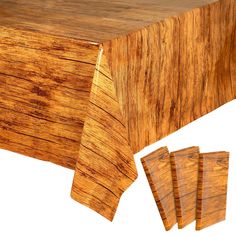 the table cloth is made from wood and has been cut into pieces to make it look like