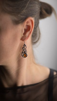 Beautiful handmade amber drop earrings for everyday wearing! :) All our items have been handmade with love and care more than 35 years ago by our family member - uncle Alfreds Holsts using the amber which he acquired in his lifetime. The amber that has been used making these rings, pendants, earrings and bracelets comes from the coast of the Baltic Sea (from 40,000,000 to 60,000,000 years old), which is the best-known and called succinite amber for containing a substantial amount of succinic aci Unique Brown Earrings For Gift, Unique Copper Earrings As Gift, Unique Copper Earrings For Gift, Vintage Amber Drop Earrings, Handmade Sterling Silver Orange Earrings, Handmade Orange Sterling Silver Earrings, Elegant Handmade Amber Earrings, Brown Baltic Amber Jewelry For Gift, Handmade Teardrop Orange Jewelry