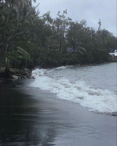 the waves are crashing into the shore