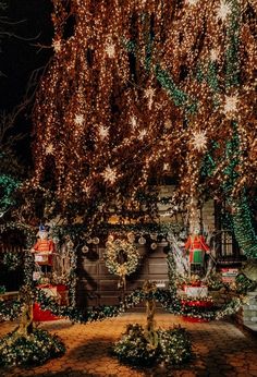 a house covered in christmas lights and decorations