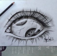 a pencil drawing of an eye with long lashes and tears on it's side