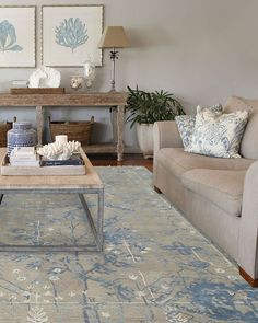 a living room with two couches and a coffee table