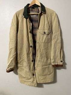 Vintage Cream Jacket  - Cream brand - Plaid lined  - Interior pocket  - Outer pockets  - Corduroy collar  - Leather cuff  - Natural wear age and distressing  Size: Large (oversized fit) Good vintage condition  No rips or holes  No stains Rugged Button-up Outerwear With Pockets, Rugged Button-up Outerwear With Patch Pockets, Rugged Utility Jacket With Long Sleeves For Workwear, Rugged Utility Jacket With Pockets For Work, Classic Utility Jacket With Corduroy Collar, Classic Utility Jacket With Corduroy Collar And Long Sleeves, Rugged Cotton Button-up Outerwear, Rugged Cotton Outerwear For Work, Vintage Khaki Outerwear With Patch Pockets